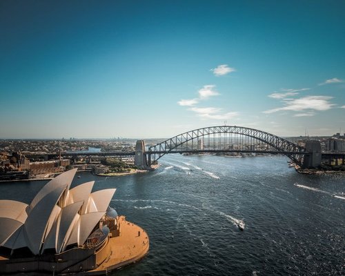 Sydney Harbour view representing premium Australian city stays